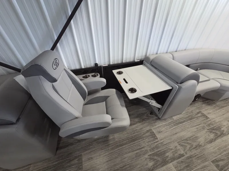 Slide: The Image of Interior of 2026 Bentley Pontoons Legacy 200 Navigator with gray seating. - 7