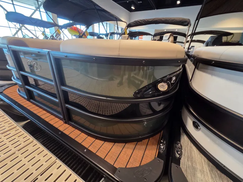 Slide: The Image of 2026 Bentley Pontoons Legacy 200 Navigator in showroom. - 3