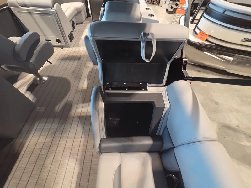 Slide: The Image of Interior of 2026 Bentley Pontoons Legacy 220 Navigator with storage compartment. - 20