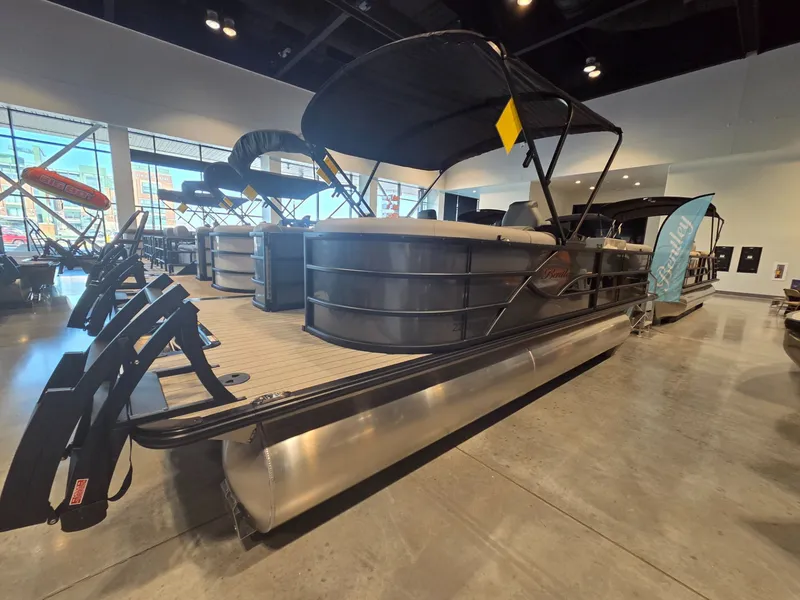 Slide: The Image of 2026 Bentley Pontoons Legacy 220 Navigator in showroom. - 3