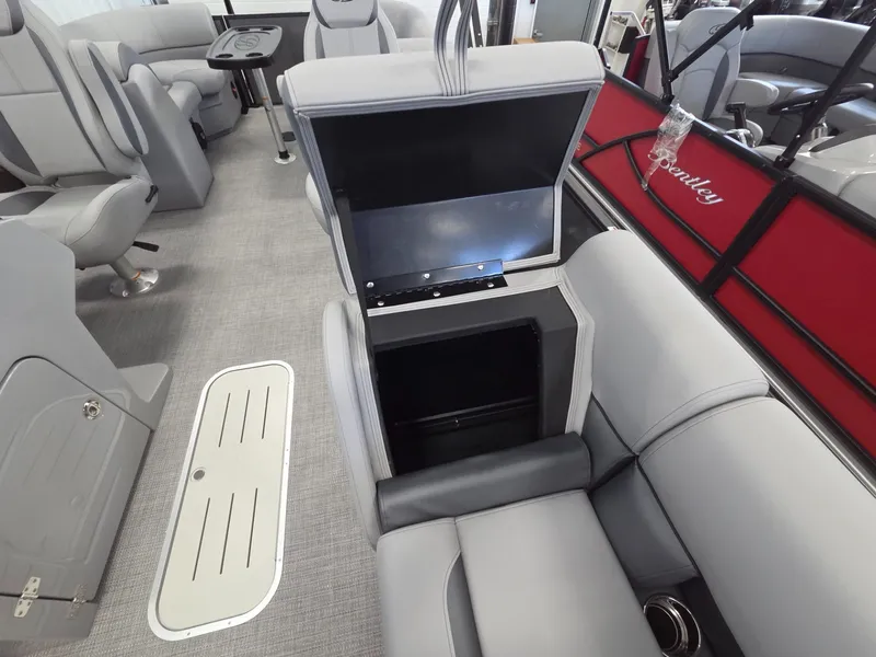 Slide: The Image of Interior of 2026 Bentley Pontoons Legacy 223 Navigator with storage compartment. - 11