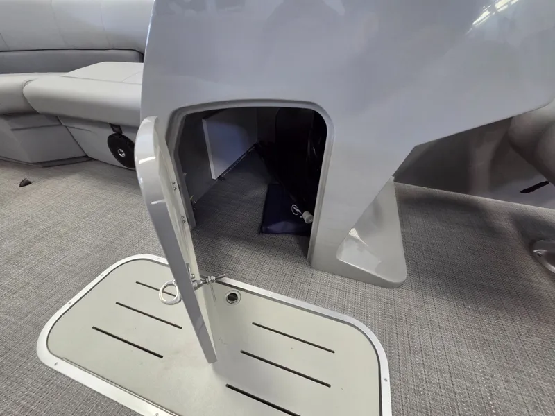 Slide: The Image of Interior of 2026 Bentley Pontoons Legacy 223 Navigator with storage compartment. - 13