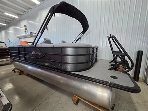 Slide: The Image of 2026 Bentley Pontoons Legacy 223 Navigator in a storage facility. - 3