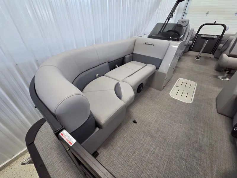 Slide: The Image of Interior of Bentley Pontoons Legacy 223 Navigator 2026 with gray upholstery. - 7
