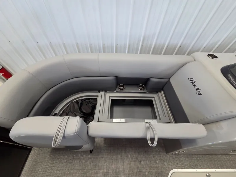 Slide: The Image of Interior of 2026 Bentley Pontoons Legacy 223 Navigator with gray seating. - 9