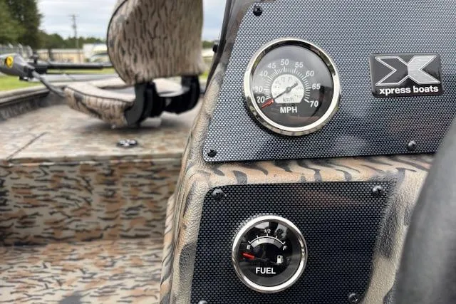 Slide: The Image of Dashboard of 2026 Xpress XP170 boat with speedometer and fuel gauge. - 14