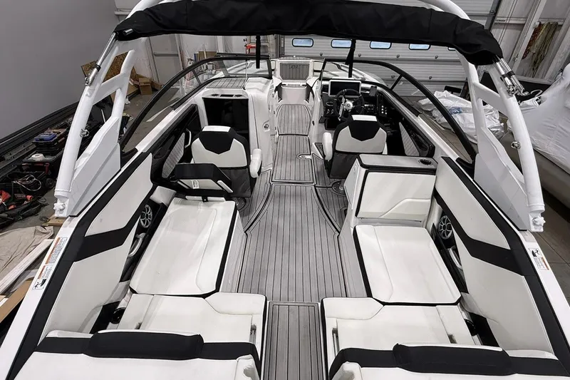 Slide: The Image of 2025 Yamaha Boats 252S interior with sleek seating and modern design. - 11