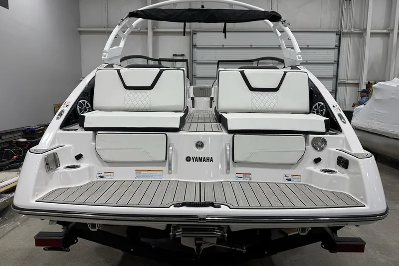 Slide: The Image of 2025 Yamaha Boats 252S, rear view showcasing sleek design and comfortable seating. - 3