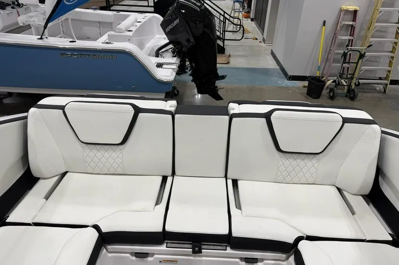Slide: The Image of Luxurious seating on 2025 Yamaha Boats 252S, featuring elegant white upholstery. - 8