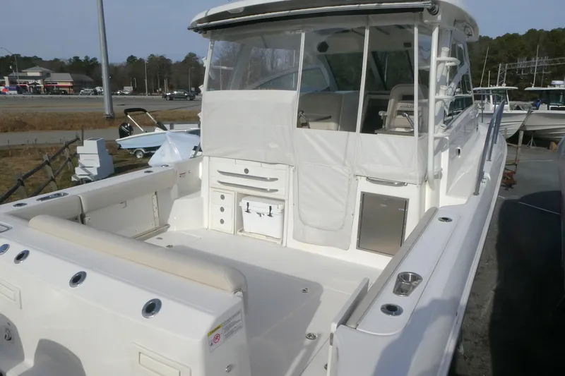 Slide: The Image of 2020 Boston Whaler 345 Conquest boat, featuring spacious deck and modern amenities. - 2