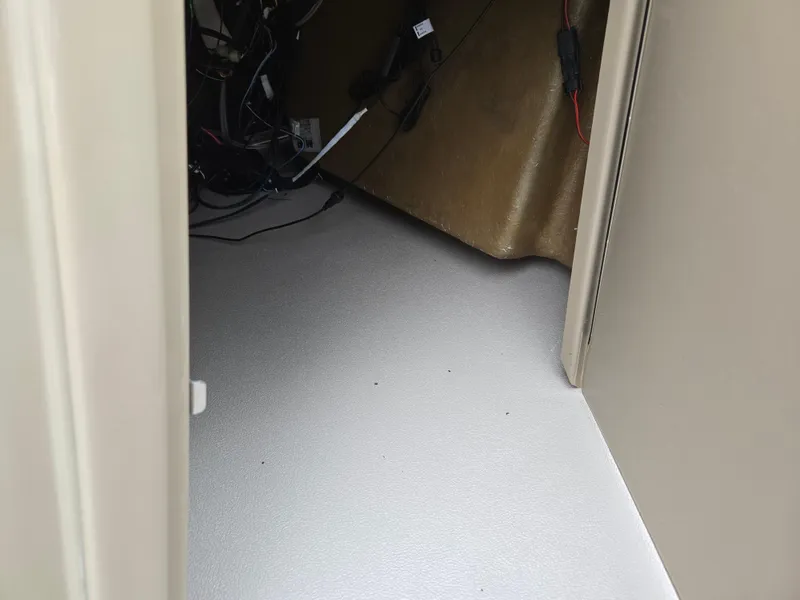 Slide: The Image of Interior view of a 2022 Sylvan Mirage Fish 822 Party Fish boat compartment. - 15