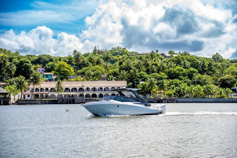 Slide: The Image of 2024 L'acqua Royale LR280 GRAN CABRIO cruising on a scenic tropical waterway. - 13