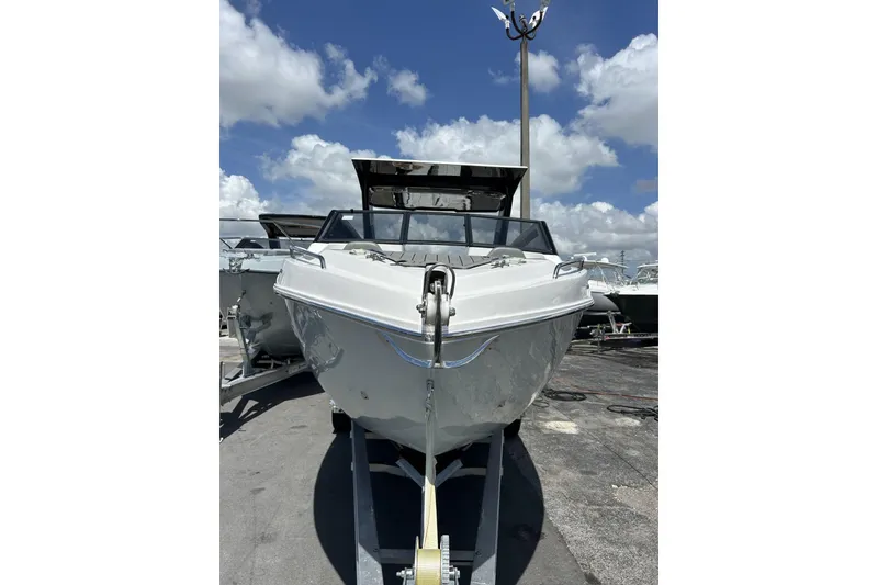 Slide: The Image of 2024 L'acqua Royale LR280 GRAN CABRIO boat on trailer under blue sky. - 20