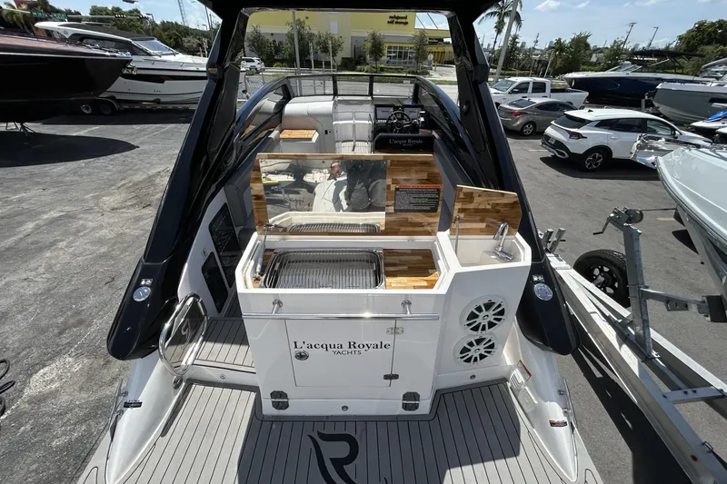 Slide: The Image of 2024 L'acqua Royale LR280 GRAN CABRIO yacht with outdoor kitchen and sleek design. - 26
