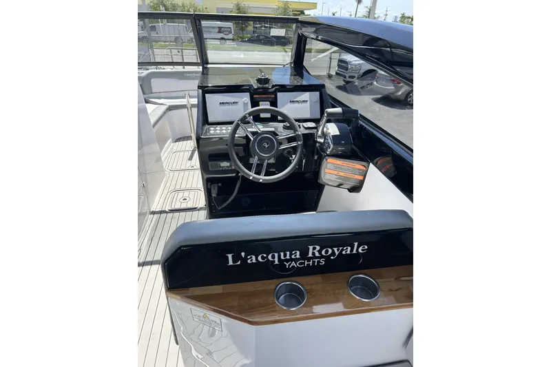 Slide: The Image of 2024 L'acqua Royale LR280 GRAN CABRIO yacht cockpit with steering wheel and controls. - 36