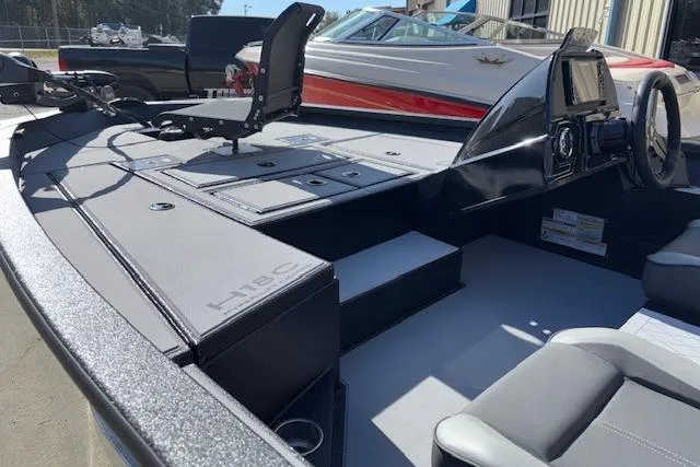 Slide: The Image of 2026 Xpress H18C Crappie boat interior with modern seating and control panel. - 12