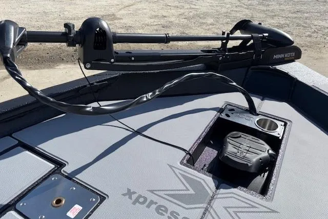 Slide: The Image of 2026 Xpress H18C Crappie boat deck with Minn Kota trolling motor. - 15