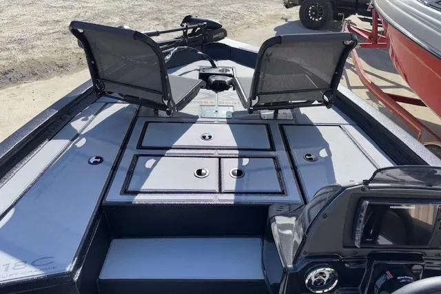 Slide: The Image of 2026 Xpress H18C Crappie boat interior with seating and storage compartments. - 17