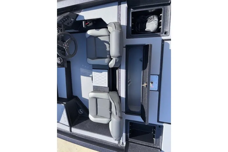 Slide: The Image of 2026 Xpress H18C Crappie boat interior with seating and storage compartments. - 20