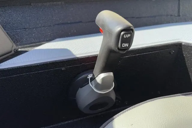 Slide: The Image of Throttle control lever on 2026 Xpress H18C Crappie boat dashboard. - 28