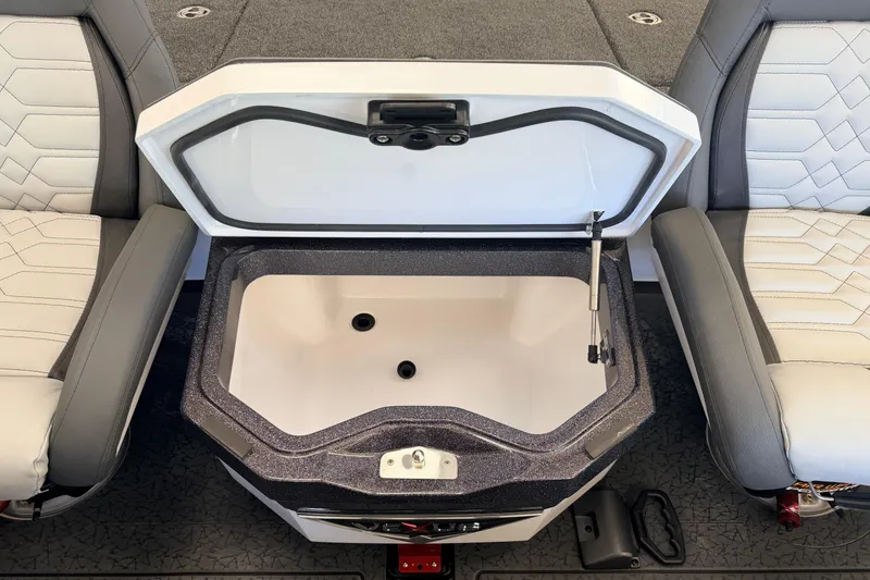 Slide: The Image of Open storage compartment in 2026 Vexus VXS20 boat, between two cushioned seats. - 11