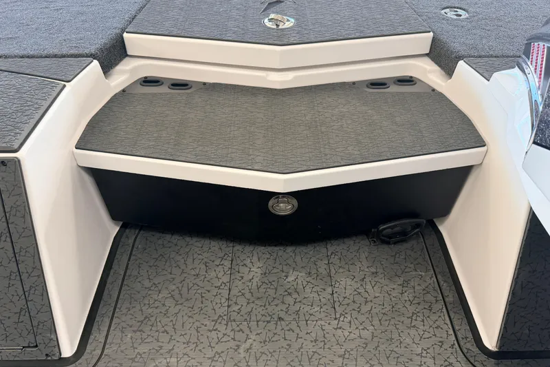 Slide: The Image of 2026 Vexus VXS20 boat interior with textured flooring and storage compartment. - 12