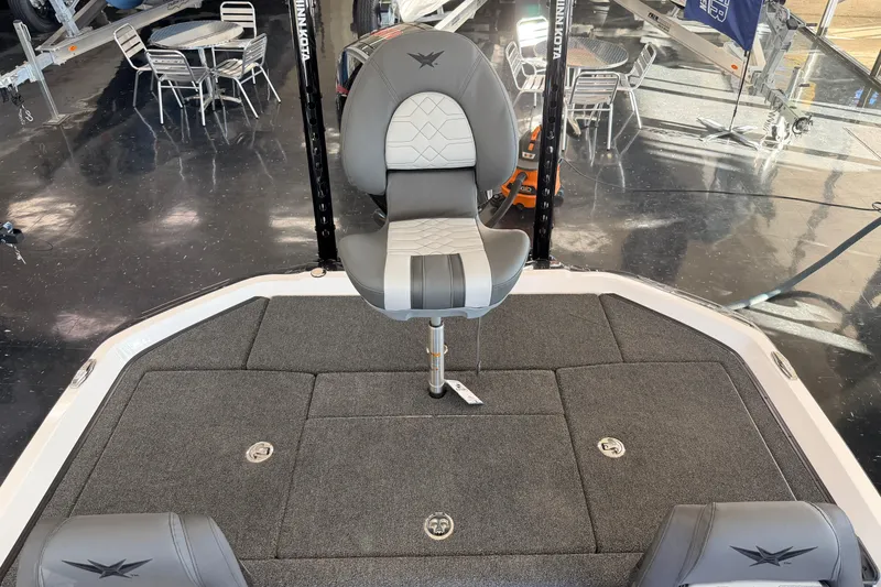 Slide: The Image of 2026 Vexus VXS20 boat interior with gray seating and carpeted deck. - 23