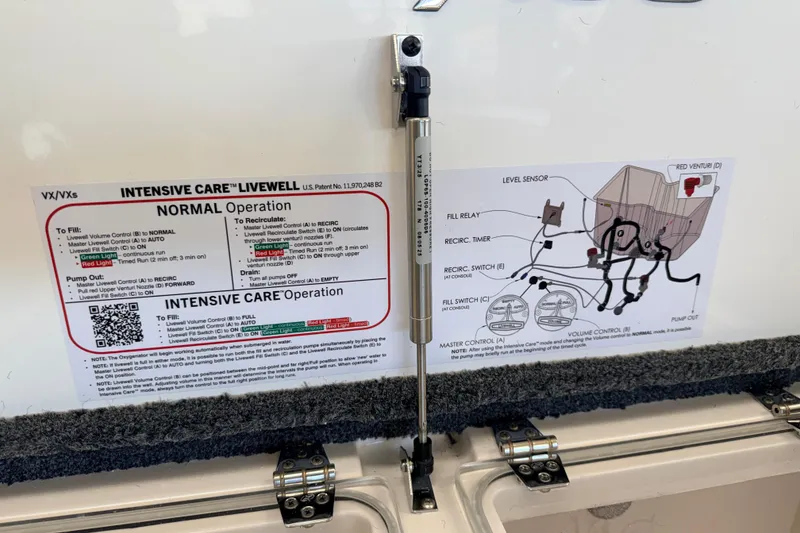 Slide: The Image of Vexus VXS20 2026 livewell operation instructions and diagram on boat interior. - 25