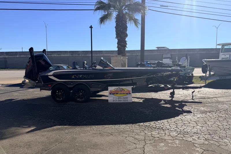 Slide: The Image of 2026 Vexus VXS20 boat on trailer, parked outdoors under sunlight. - 3