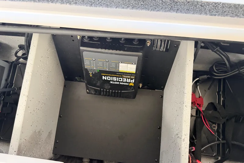 Slide: The Image of Battery compartment of 2026 Vexus VXS20 with Minn Kota Precision charger. - 33