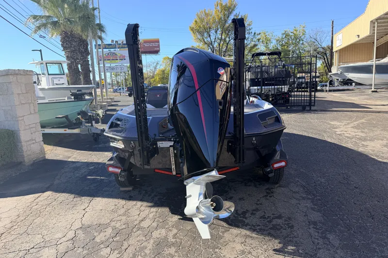 Slide: The Image of 2026 Vexus VXS20 boat with powerful outboard motor, parked outdoors. - 4