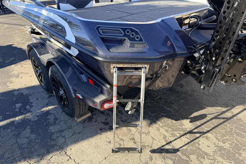 Slide: The Image of 2026 Vexus VXS20 boat rear view with ladder and dual axle trailer. - 7