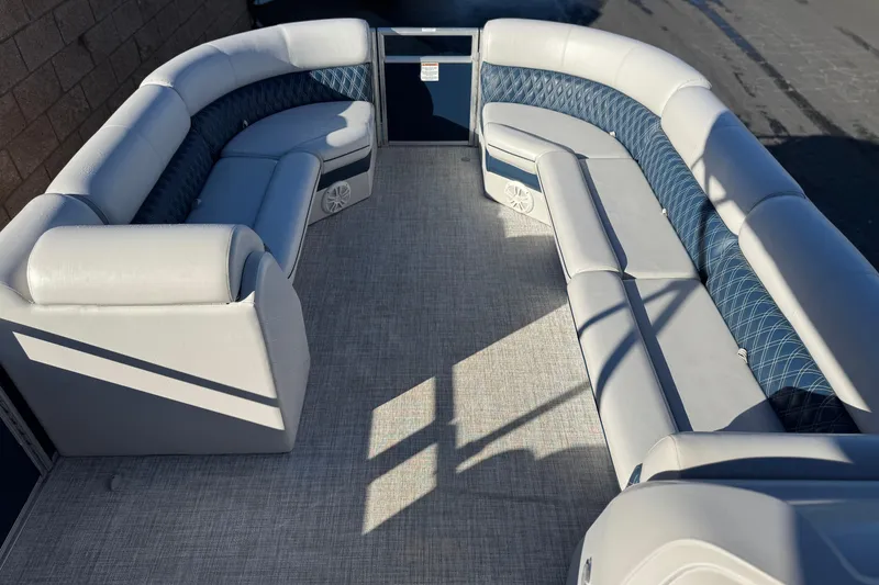 Slide: The Image of 2023 Nepallo 22TL pontoon boat interior with luxurious seating and modern design. - 10