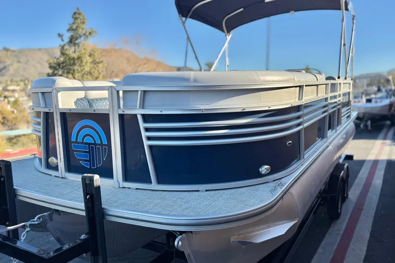 Slide: The Image of 2023 Nepallo 22TL pontoon boat with sleek design and modern features. - 3