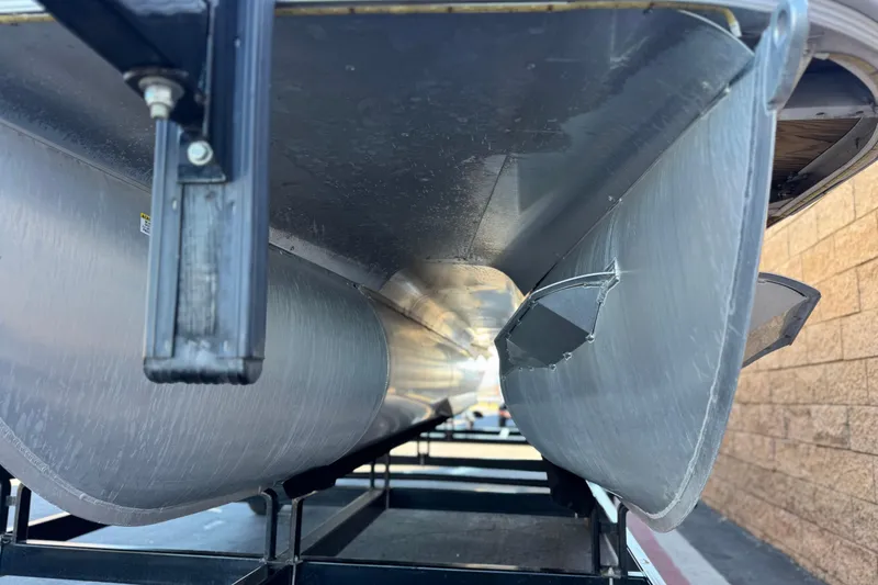 Slide: The Image of Underneath view of 2023 Nepallo 22TL pontoon boat on a trailer. - 4