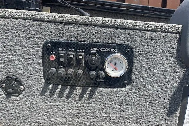 Slide: The Image of Control panel of a 2019 Tracker Panfish 16 boat with fuel gauge and switches. - 9