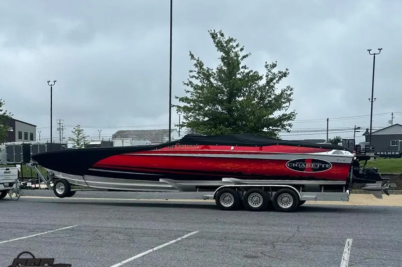 Slide: The Image of 2011 Cigarette 39' Top Gun Unlimited boat on trailer at Grand Sport Center. - 15
