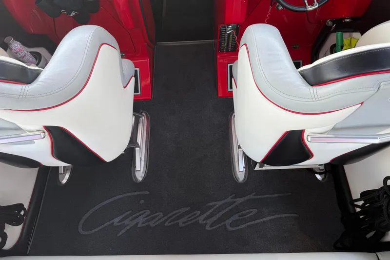 Slide: The Image of 2011 Cigarette 39' Top Gun Unlimited boat with vibrant red and black flame design. - 25