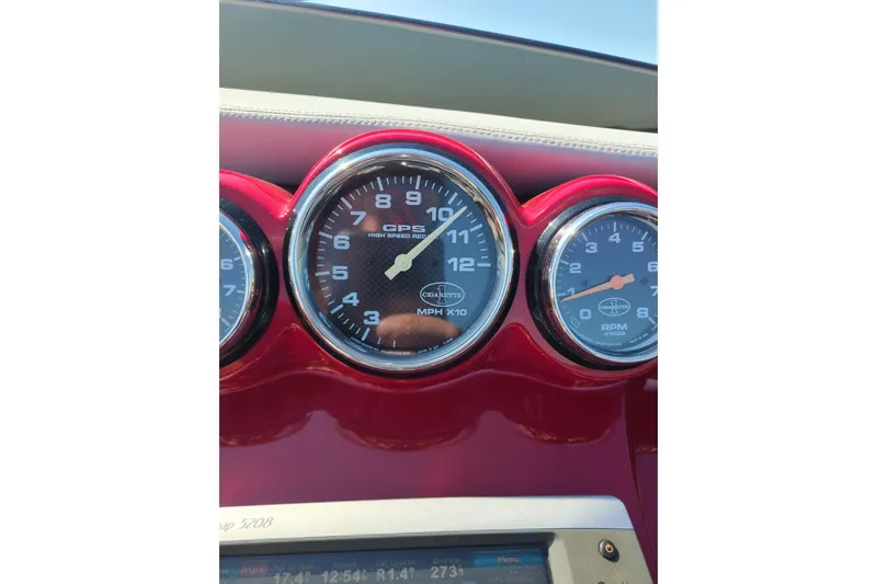 Slide: The Image of Rear view of a 2011 Cigarette 39' Top Gun Unlimited boat with Mercury engines. - 31