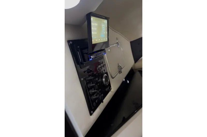 Slide: The Image of 2011 Cigarette 39' Top Gun Unlimited logo with red number one. - 34