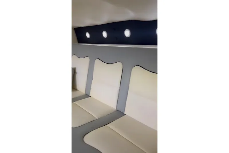 Slide: The Image of 2011 Cigarette 39' Top Gun Unlimited boat, aerial view, red and black design. - 36