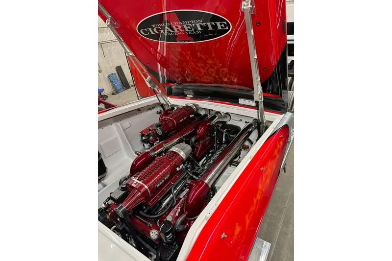 Slide: The Image of 2011 Cigarette 39' Top Gun Unlimited boat with racing team logo on deck. - 42