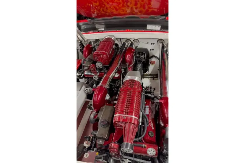 Slide: The Image of 2011 Cigarette 39' Top Gun Unlimited boat with racing team logo on deck. - 44