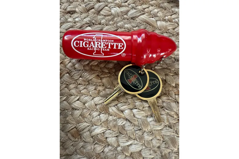 Slide: The Image of World Champion Cigarette Racing Team logo on 2011 Cigarette 39' Top Gun Unlimited. - 47