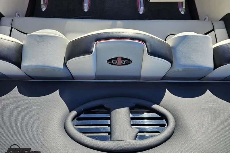 Slide: The Image of Interior of 2011 Cigarette 39' Top Gun Unlimited boat, featuring sleek seating and design. - 51