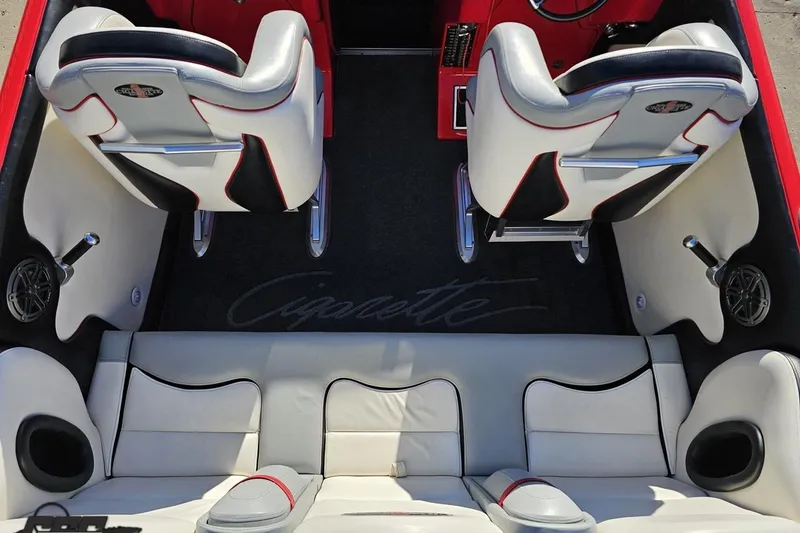 Slide: The Image of Interior of 2011 Cigarette 39' Top Gun Unlimited boat with stylish seating and logo. - 52