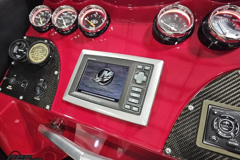 Slide: The Image of Dashboard of 2011 Cigarette 39' Top Gun Unlimited with gauges and control panel. - 60