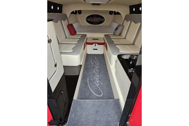 Slide: The Image of Luxurious interior of a 2011 Cigarette 39' Top Gun Unlimited boat, featuring plush seating. - 78