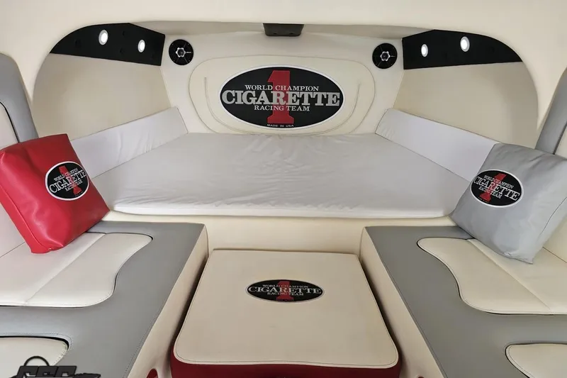 Slide: The Image of Interior of 2011 Cigarette 39' Top Gun Unlimited boat with branded cushions and seating. - 82