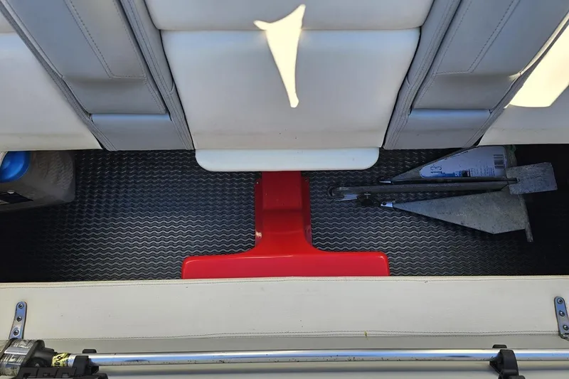 Slide: The Image of Interior of 2011 Cigarette 39' Top Gun Unlimited boat with anchor and red support. - 89